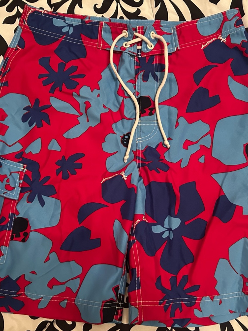American Eagle Outfitters Red Swim Trunks with Blue Floral Accents